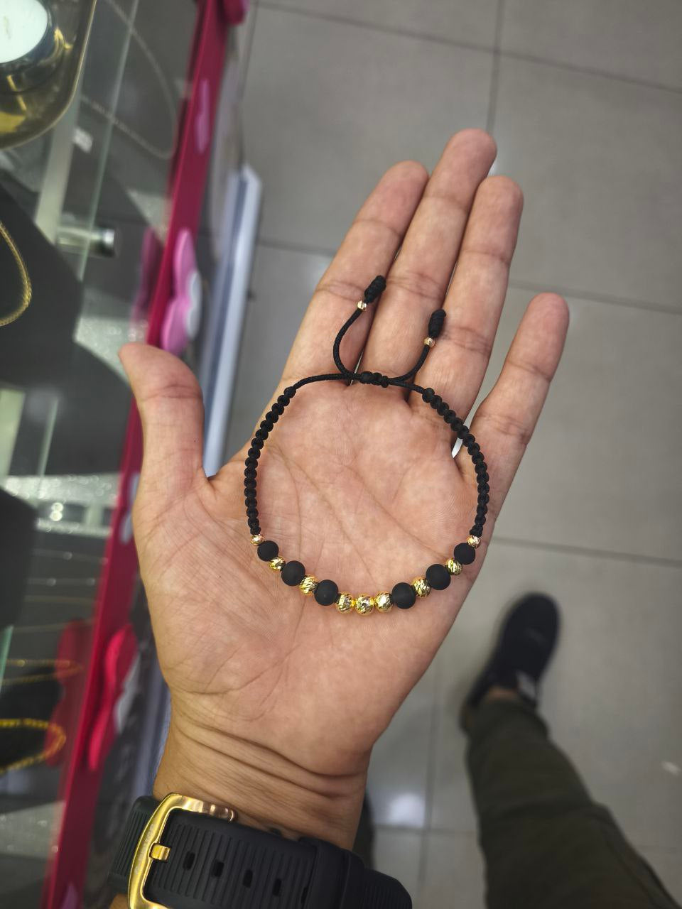 Pulsera artesanal de oro 18K con bolas diamantadas y envío gratis en Colombia