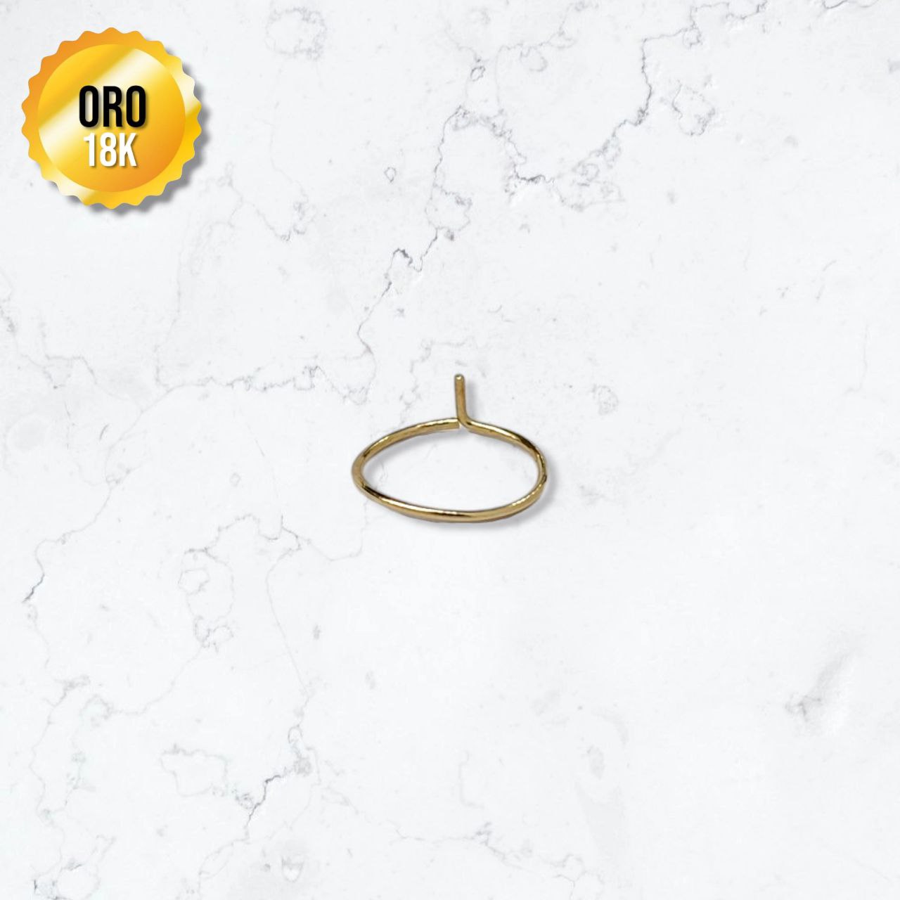 piercing en oro de 18K color dorado en forma de aro para la nariz