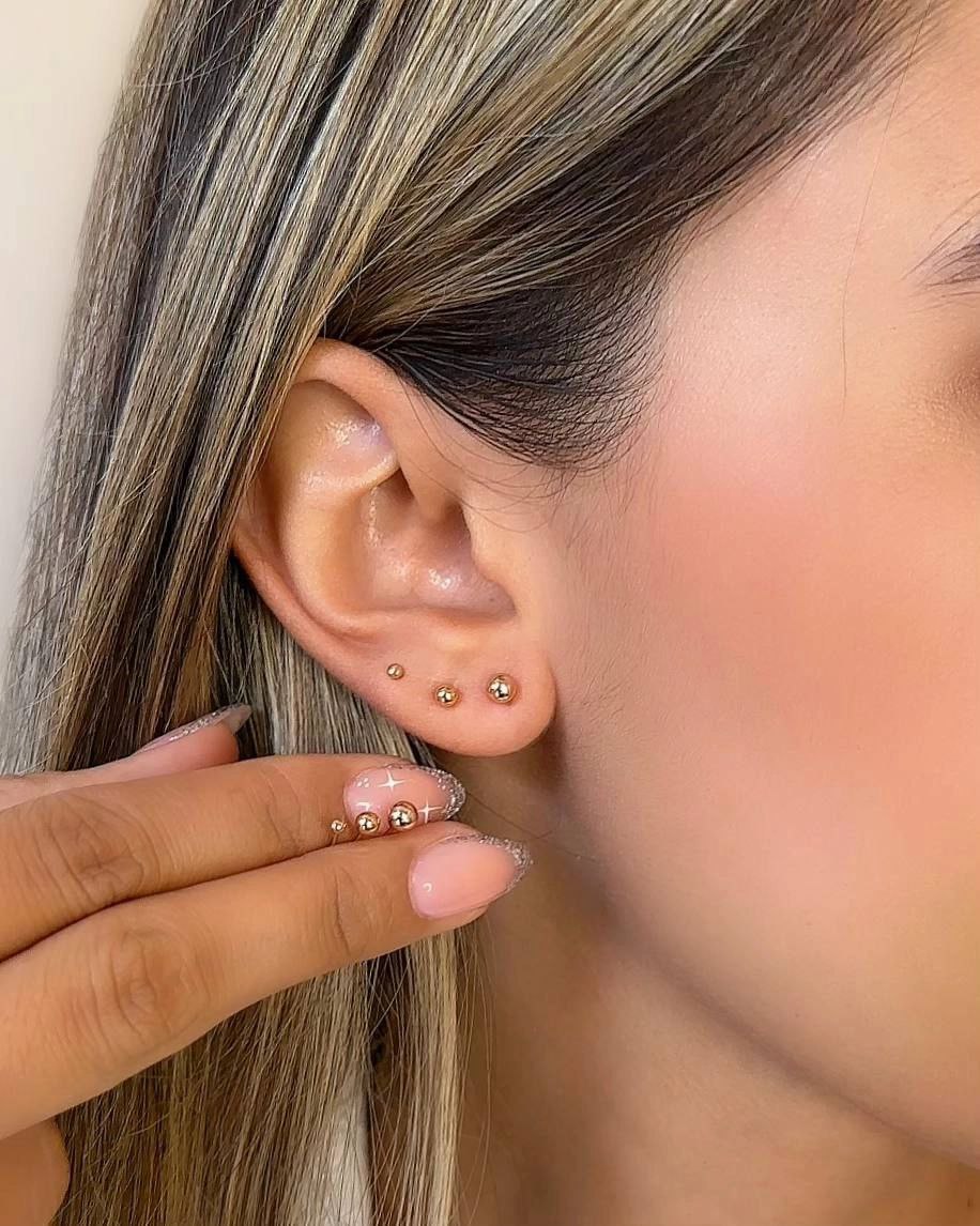 aretes bola trio oro laminado 18k