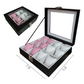 Estuche organizador de relojes color negro con interior rosa blanco – vista superior
