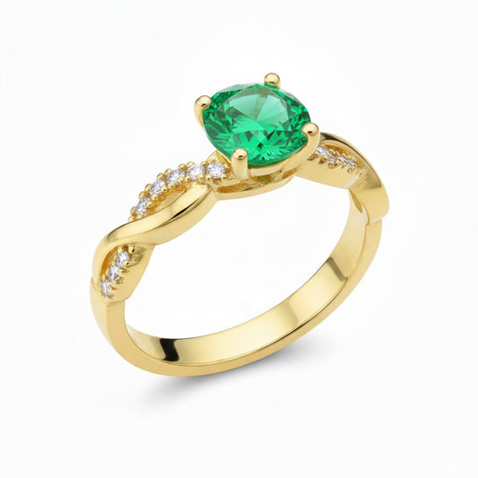 anillo de compromiso oro 18k piedra verde artesanal Colombia