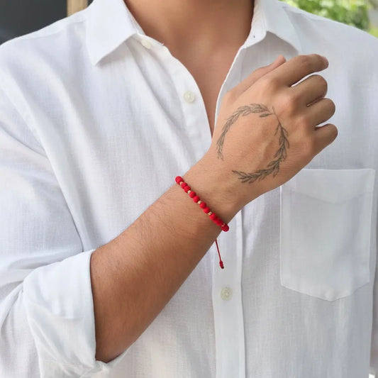 pulsera-hilo-rojo-oro-18k-proteccion-balines-detalle