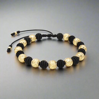 Pulsera tejida con hilo terlenca y balines grandes diamantados de oro 18K para mujer u hombre, hecha a mano en Colombia.