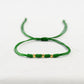 Pulsera de hilo verde esperanza con 3 balines de oro 18k - Brillo Encanto